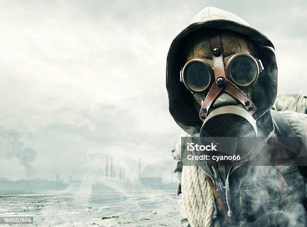 Man In Gas Mask Witnessing Environmental Disaster Stock Photo - Download Image Now - Gas Mask, Men, Judgment Day - Apocalypse