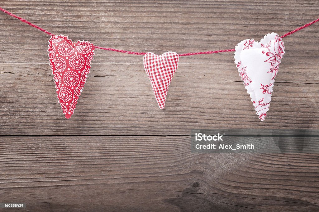 Hearts Three handmade hearts on wooden background Art And Craft Stock Photo