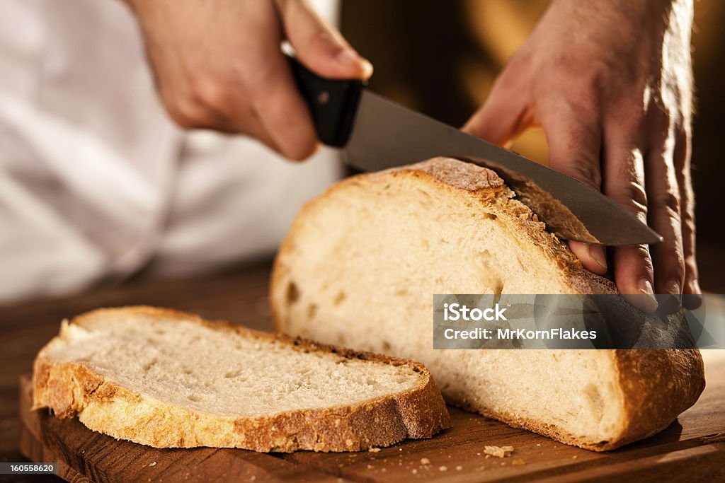 FATIANDO pão - Foto de stock de Adulto royalty-free