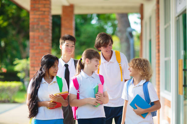 istock Kids back to school. Group of children. 1605587007