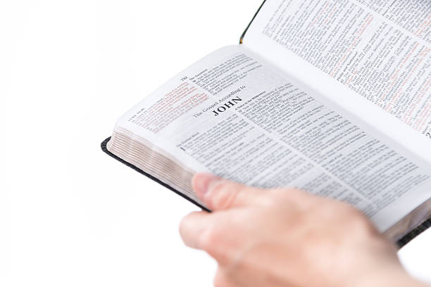 istock Adult Male Holding Religious Text 160559184