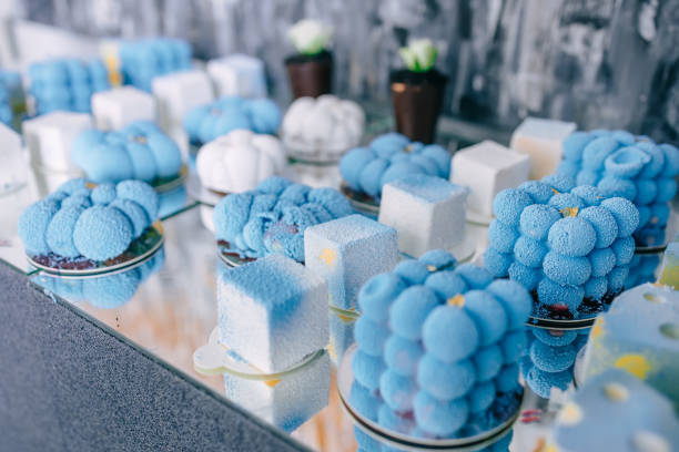 istock delicious candy bar at a luxury wedding reception. an exclusive expensive table with modern desserts in white and blue 1605596198