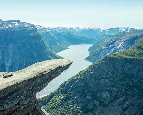Trolltunga with a beautiful view of a fjord in Norway