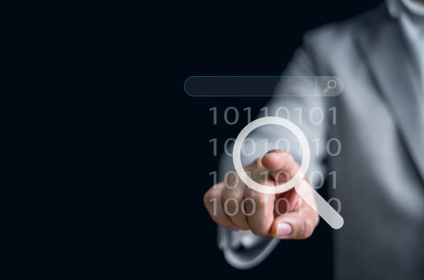 istock Businessman uses tools to search for information. SearchEngine Optimization SEO Networking, Internet search technology online. 1605610263