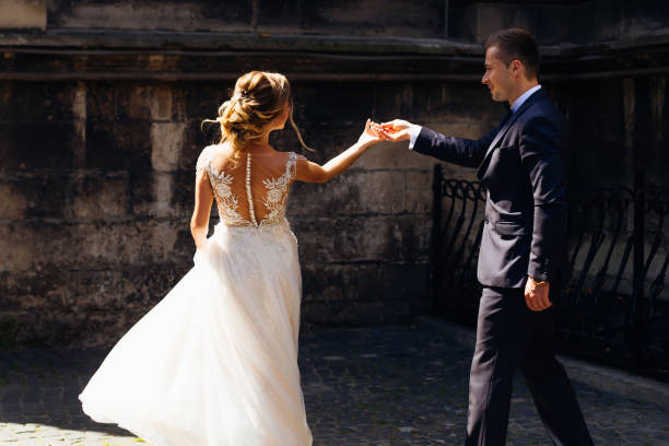 istock couple dancing in old city 1605625658