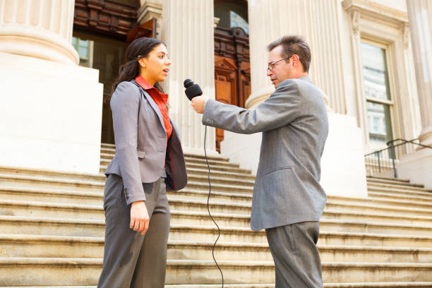 istock Man Interviews Female Politician 160564598