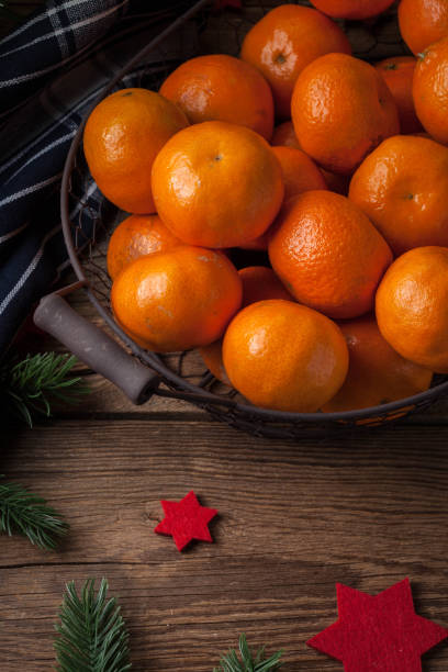 istock Basket of tangerines. 1605660927