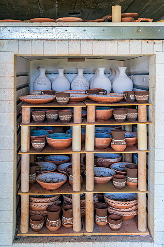 Ceramic objects decorated and placed in the oven for drying. Horezu area, Romania