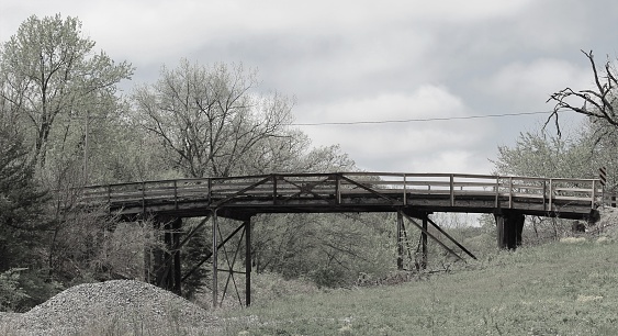 An old bridge with trees