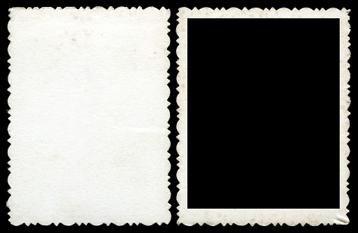 Blank photo frame & background isolated on black.