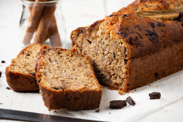 istock Sliced moist banana bread with oats and dark chocolate chunks 1605740696