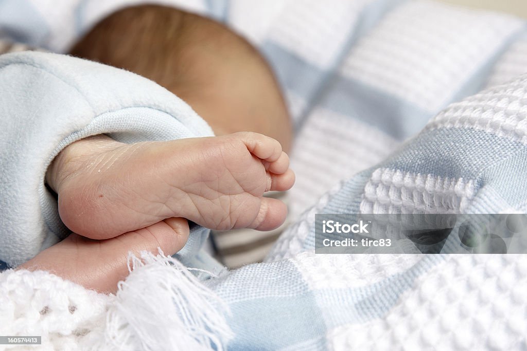 Baby's feet and toes showing heel prick Human Foot Stock Photo