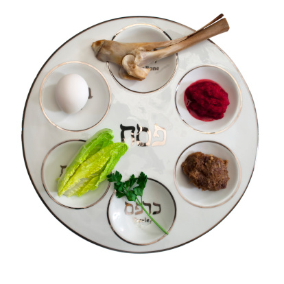 Modern Seder plate with traditional foods of the passover.
