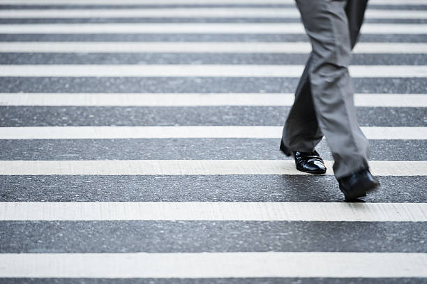 istock Suit crossing street, motion blur 160582344