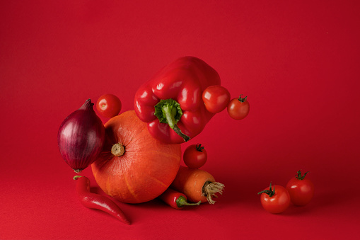 Fresh vegetables in an abstract composition. Top view of vegetable ingredients with space for text.