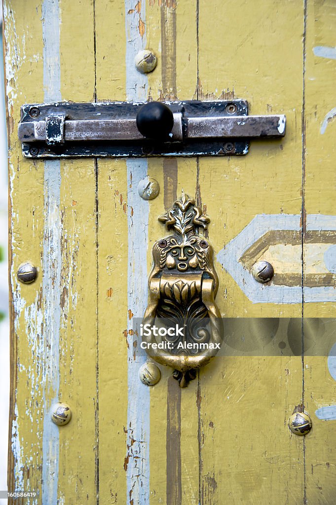 Door latch Old  wooden door and lock Building Entrance Stock Photo