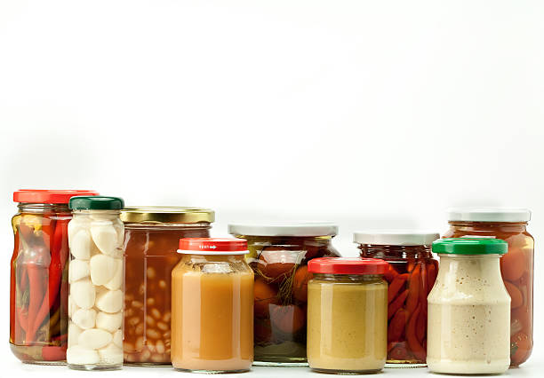 istock five jars of preserved green peas isolated on white 160586565