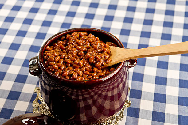 istock Pot of Baked Beans on a Blue Gingham 160588952