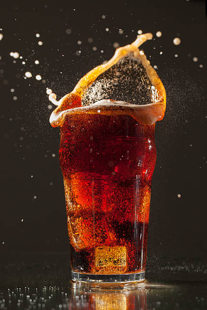 istock Pint of Cola with ice cube splash 160589635