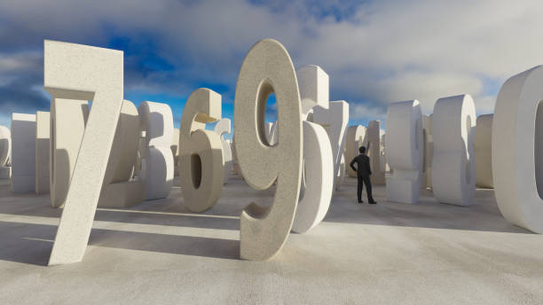 istock Man in field of large numbers. 1605911622