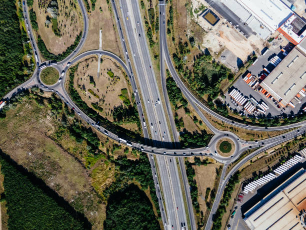 istock Roads, roundabouts, speedways and highways, aerial view 1605911654