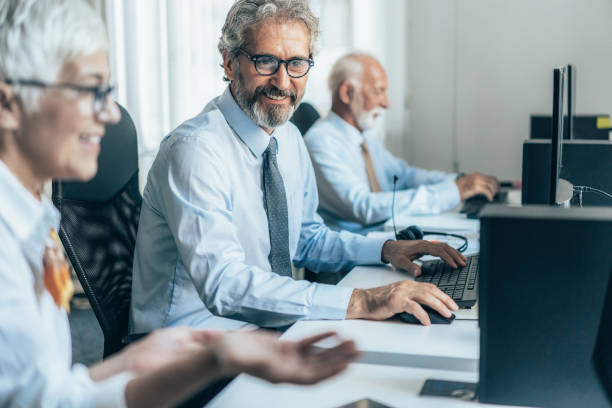 istock Senior business people working in the office 1605914334