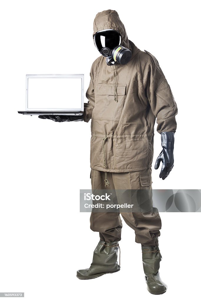 Uomo in tuta di rischio con un computer portatile - Foto stock royalty-free di Adulto