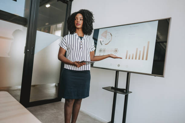 istock A business woman presenting financial result 1605948107