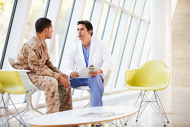 istock Doctor Counselling Soldier Suffering From Stress 160595673