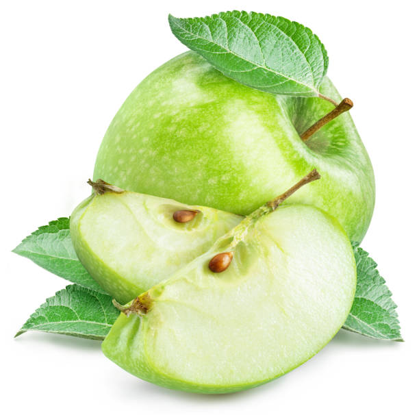 istock Green ripe apple and apple slices on white background. 1605959029