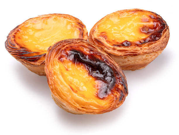 istock Pastel de nata tarts isolated on white background. 1605961854