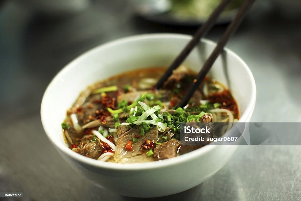 Vietnamese beef noodle soup called pho Vietnamese beef noodle soup called pho, with green onion, bean sprouts and chili. Pho Soup Stock Photo