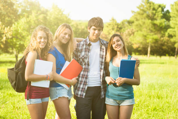 istock College student on a campus cheerful toghether 160599666