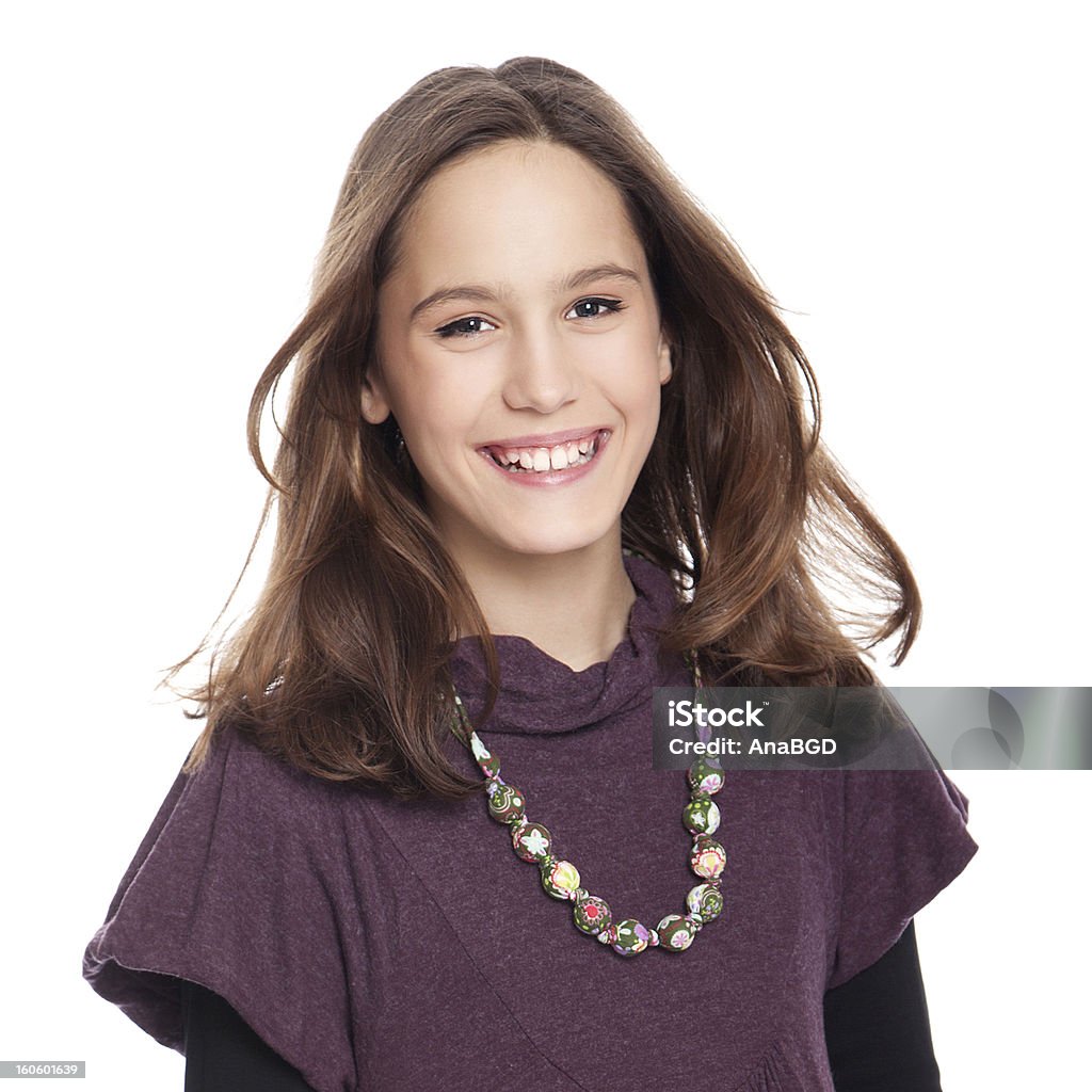 Teenage girl. Portrait of a beautiful teenage girl smiling, isolated on white 14-15 Years Stock Photo