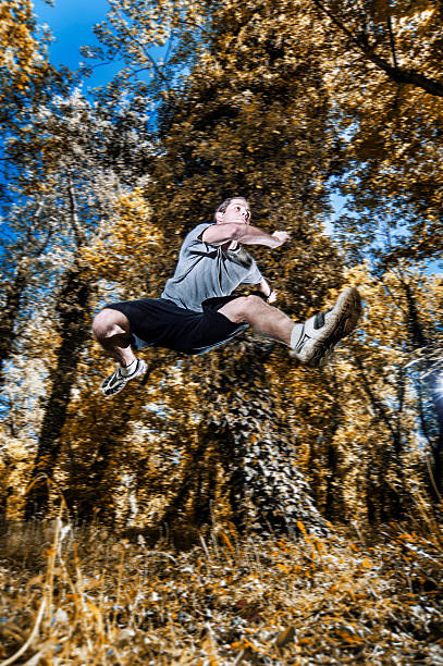 istock Man running in nature on autumn day 160602038