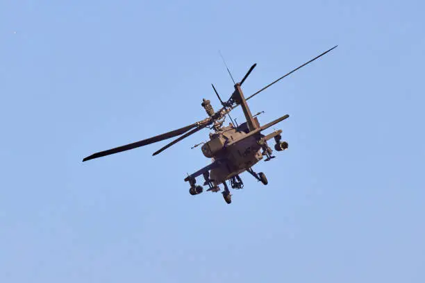AH 64 Apache - military helicopter performing a demonstration flight.