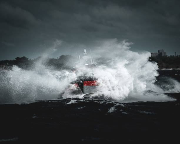 Boat crashing through waves with water spray
