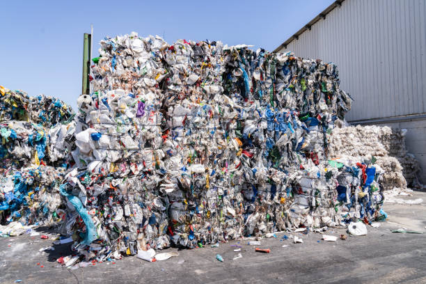 istock Stacks of Compacted Recyclables and Bundled Recyclables. 1606145388