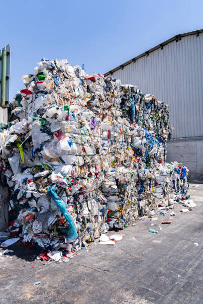 istock Stacks of Compacted Recyclables and Bundled Recyclables. 1606147454