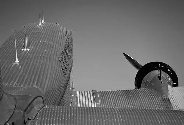 Detail view of a historic airplane - the JUNKERS JU 52. This was a transport aircraft which was built from 1932 to 1945 in Germany. Some versions of the plane have been used also for passenger transport (airliner) and also as a medium bomber in WW2. The plane had the nickname "Tante Ju - Autnie Ju".