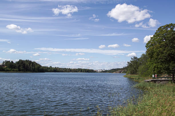 istock Scenic view of lake against sky 1606154329