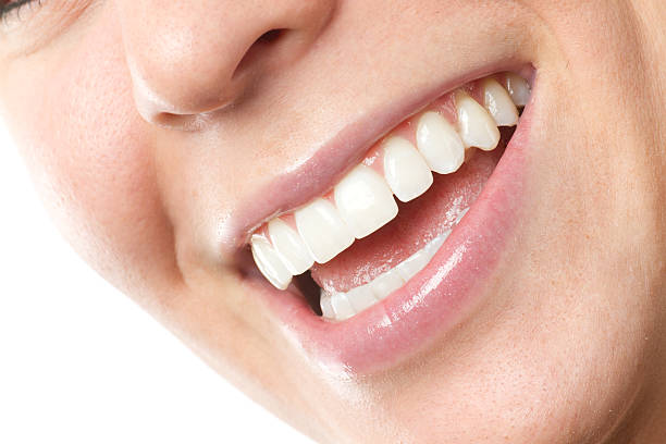 Woman Smiling woman with a nice happy smile tooth enamel stock pictures, royalty-free photos & images