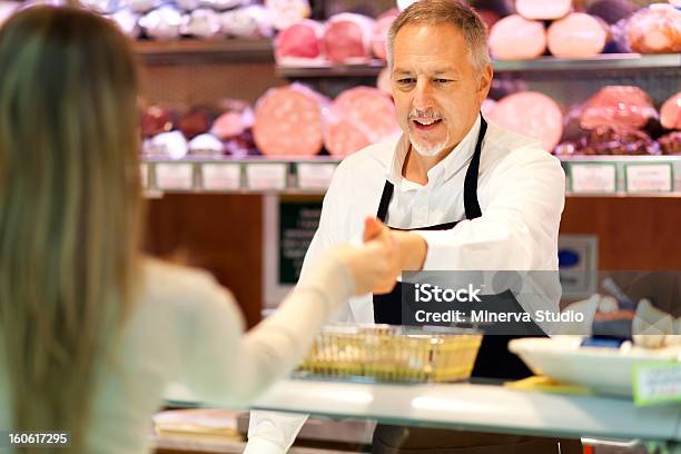 Shopping At The Supermarket Stock Photo - Download Image Now - Butcher's Shop, Butcher, Selling