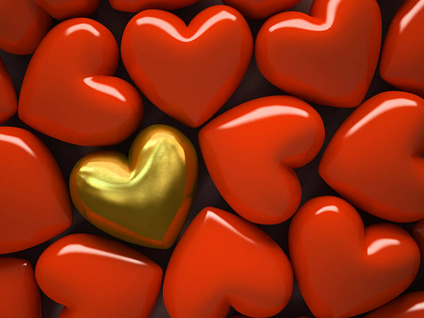 istock Red  hearts and one gold heart isolated on background 160619249