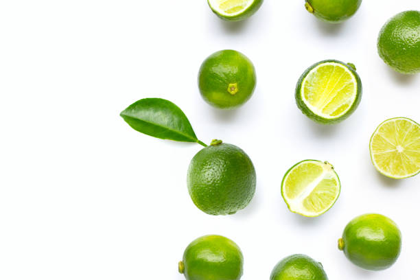 istock Frame made of limes isolated on white background. 1606269996