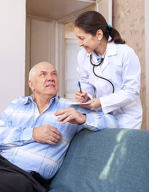 istock doctor asked male mature patient feels 160631099