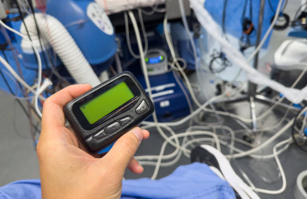 istock Pager or beeper, Symbol of efficient tech communication in busy work life, bridging gaps, enabling swift responses, enhancing work dynamics 1606318177