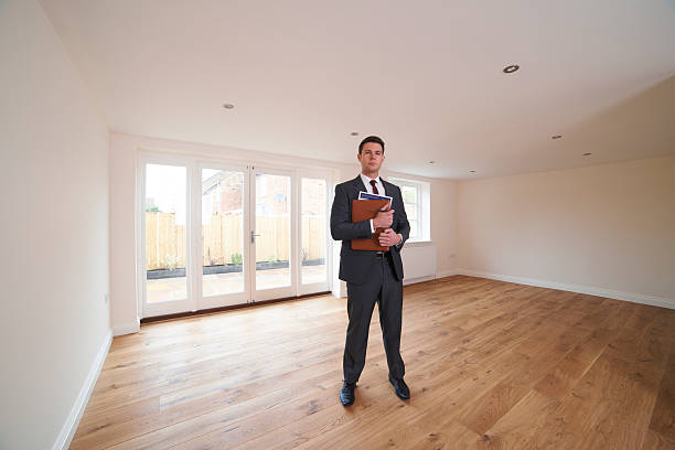 istock Estate Agent Looking Around Vacant New Property 160632226