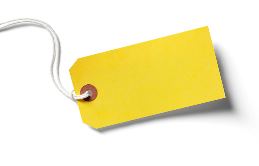 Yellow label, isolated on white with clipping path and copy space.