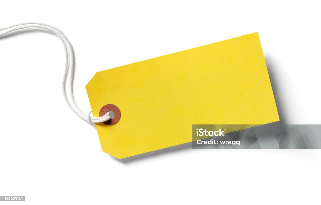 Yellow paper label with shadow on white Yellow label, isolated on white with clipping path and copy space. Price Tag Stock Photo